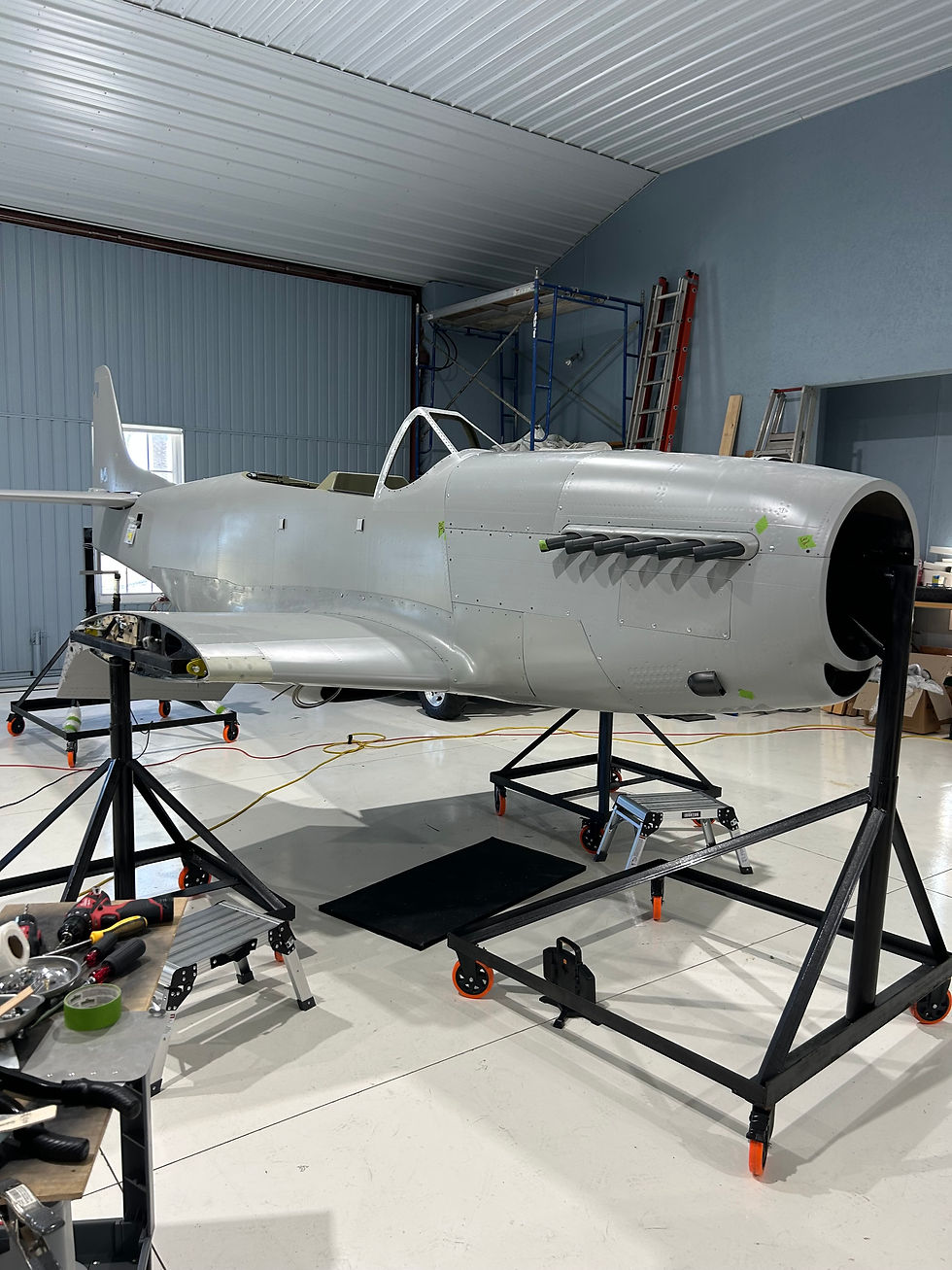 Aircraft fuselage on stands ready for mobile aviation painters.