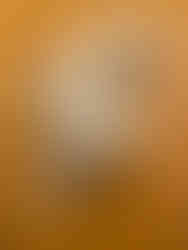 A rolled up towel tied in a knot