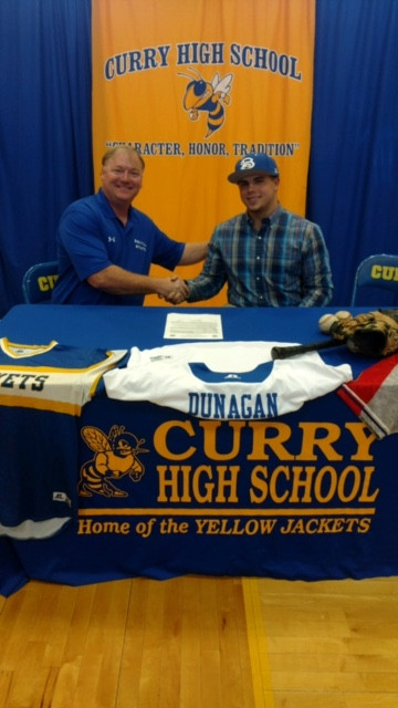 Photo of Caleb Dunnigan signing with Bevill State Baseball