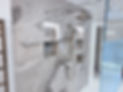 a modern bathroom with marble walls