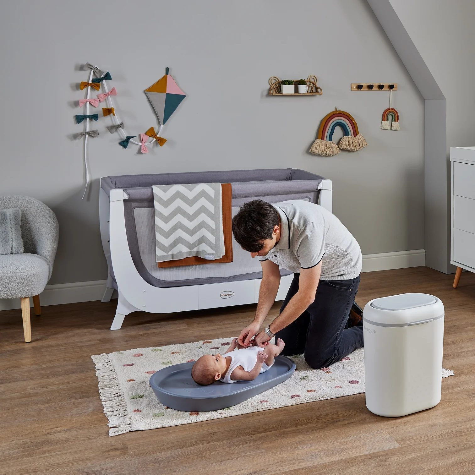 Dadchangingbabyonfloor_BincentreSquareHighResresized_1512x.webp