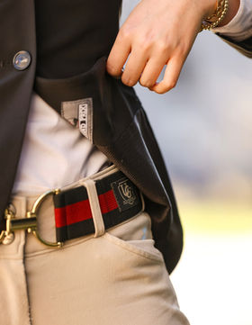 A custom Bedford-Jones belt with red and black stripes