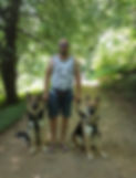 Andrew moxey with our two German Shepherds