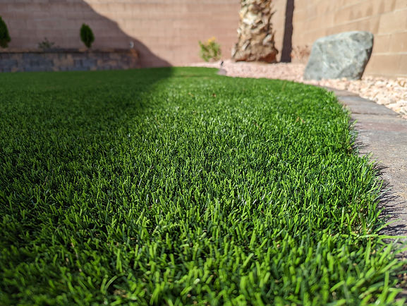 Close up picture of vibrant green artificial grass turf in St. George Utah