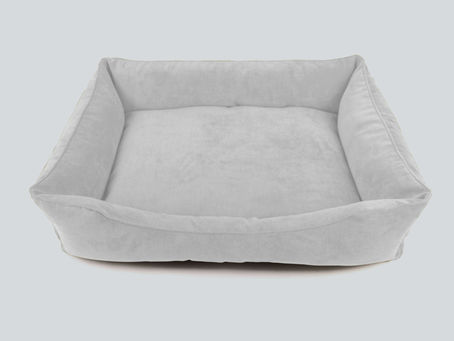 Light gray rectangular dog bed with raised edges and a soft cushioned base, placed on a neutral background. If you’d like, I can also draft a short caption or product description for it — just let me know!