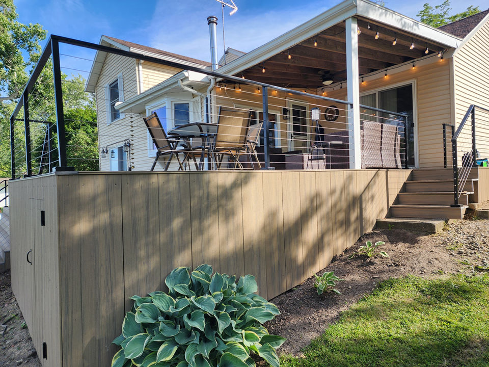 A custom composite deck by Turkey Creek Construction in Syracuse.