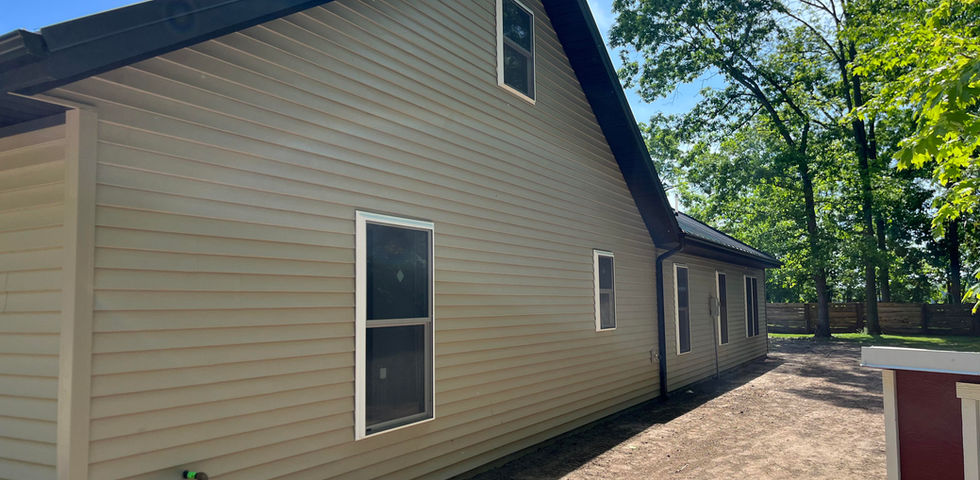 A new addition with metal roofing.