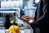 operations-director-solar-panel-factory-monitoring-efficiency-metrics.jpg