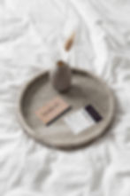 Studio CC Hair Salon brand stationery displayed on a tray including business cards and appointment cards