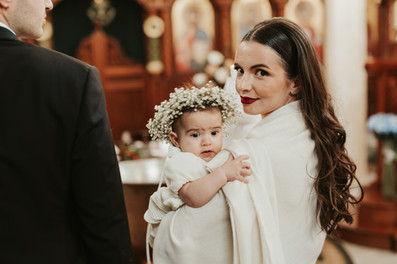 Родители и деца по време на кръщене