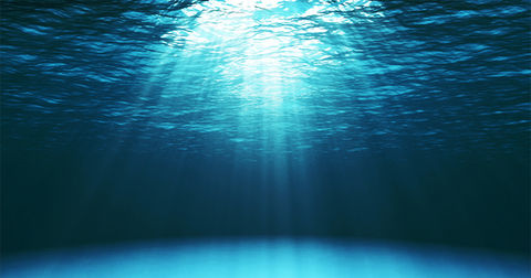 Darkblueoceansurfaceseenfromunderwater