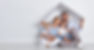 a family holding a roof over their heads