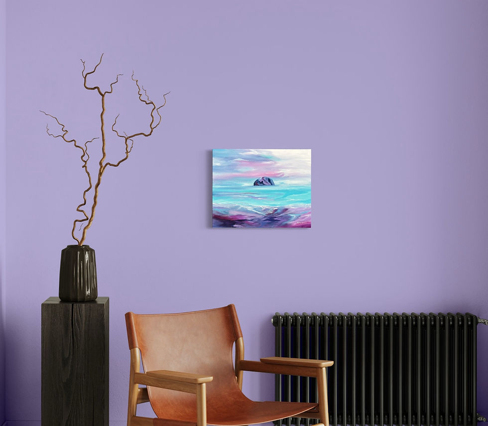 Thumbnail: Ailsa Craig 2019 Painting displayed on a lilac wall above a brown chair and a table