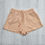 Thumbnail: H&M peach shorts. Uk 8-10