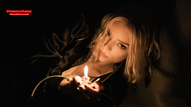Anya Taylor-Joy as Lucky holds a small flame in an official Apple TV first-look image accompanying coverage of the Lucky limited-series finale.