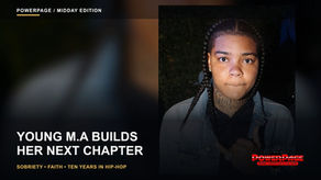 Young M.A faces the camera in a denim jacket with her complete head and upper body visible