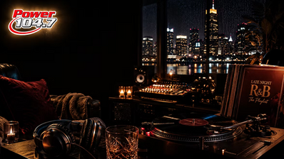 Late-night R&B listening room with turntable, headphones and Power 104.7 Baltimore logo
