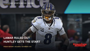 Lamar Jackson wears a helmet and white number 8 Ravens jersey on the field.