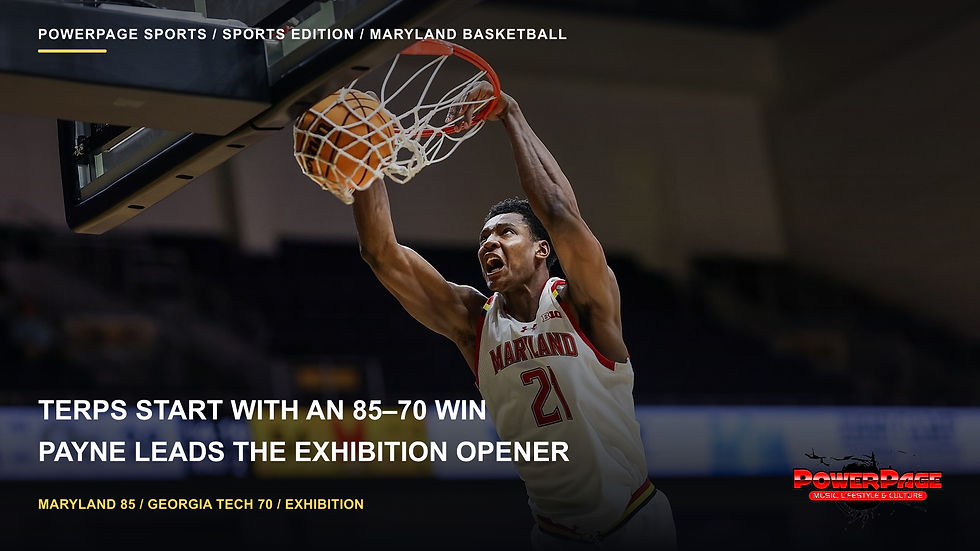 Maryland’s Pharrel Payne, wearing number 21, hangs from the rim after a two-handed dunk against Georgia Tech.