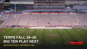 A view across Maryland’s football field toward the home-side bleachers and press box in College Park.