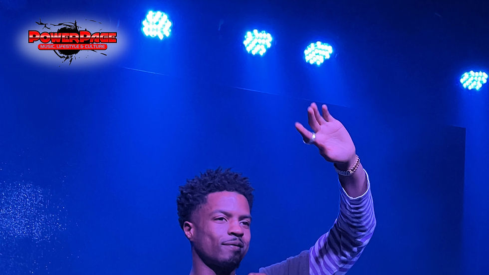 Pi’erre Bourne performing onstage with the official PowerPage editorial logo