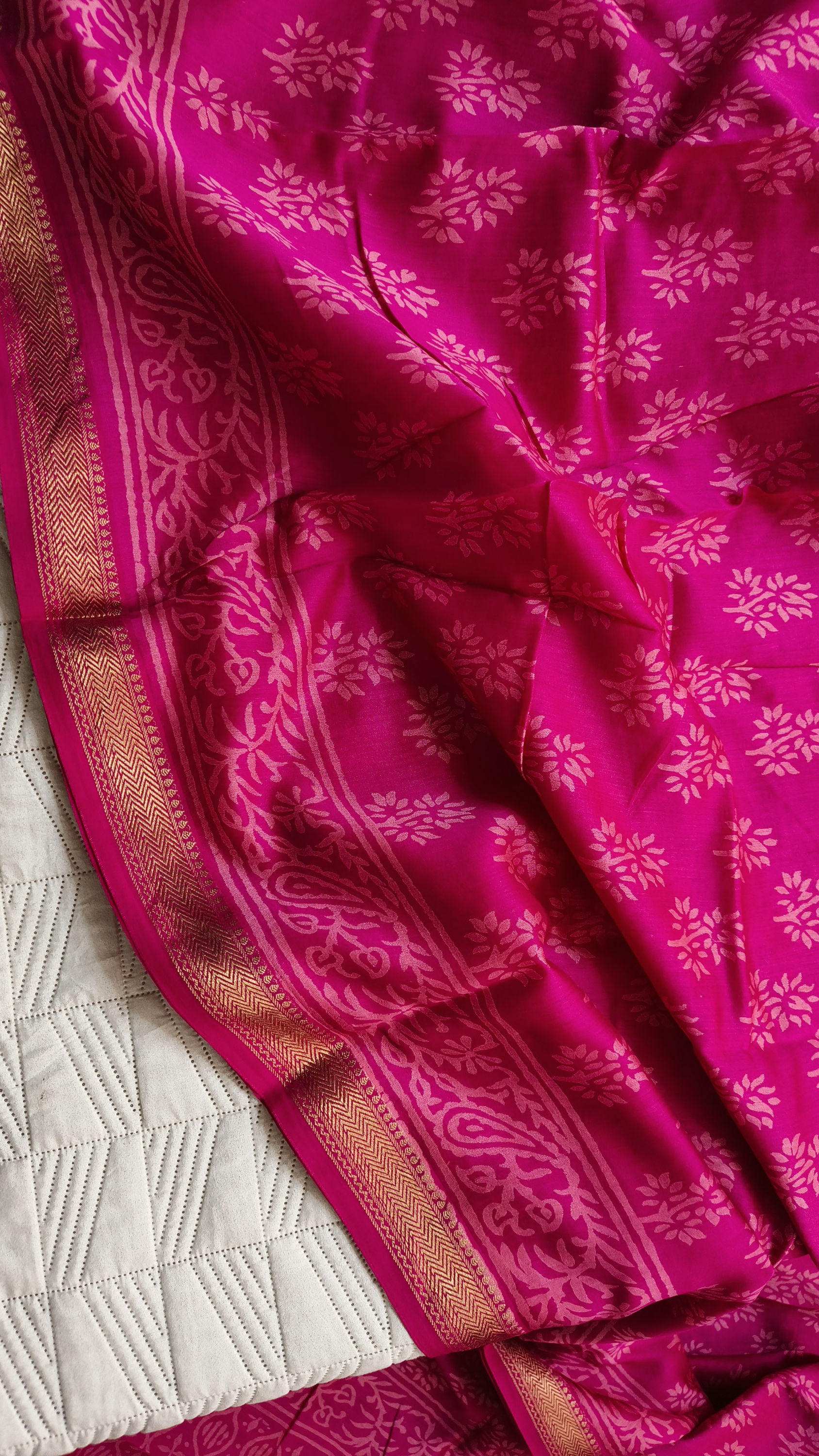 Close-up of handblock printed border on Maheshwari cotton silk saree showing traditional craftsmanship