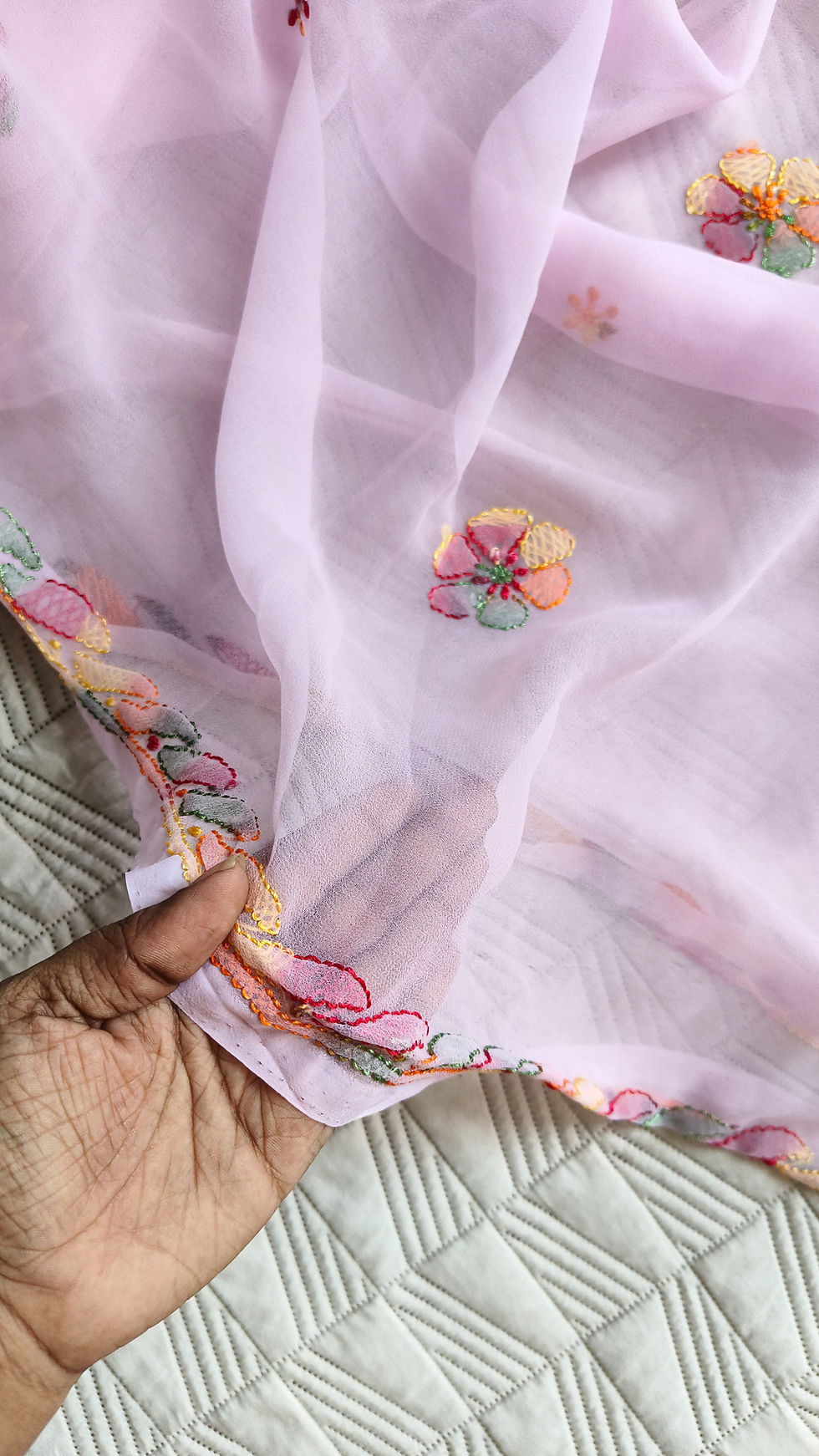 Thumbnail: Pastel georgette Chikankari saree with multicolour embroidery, buta motifs and embroidered pallu