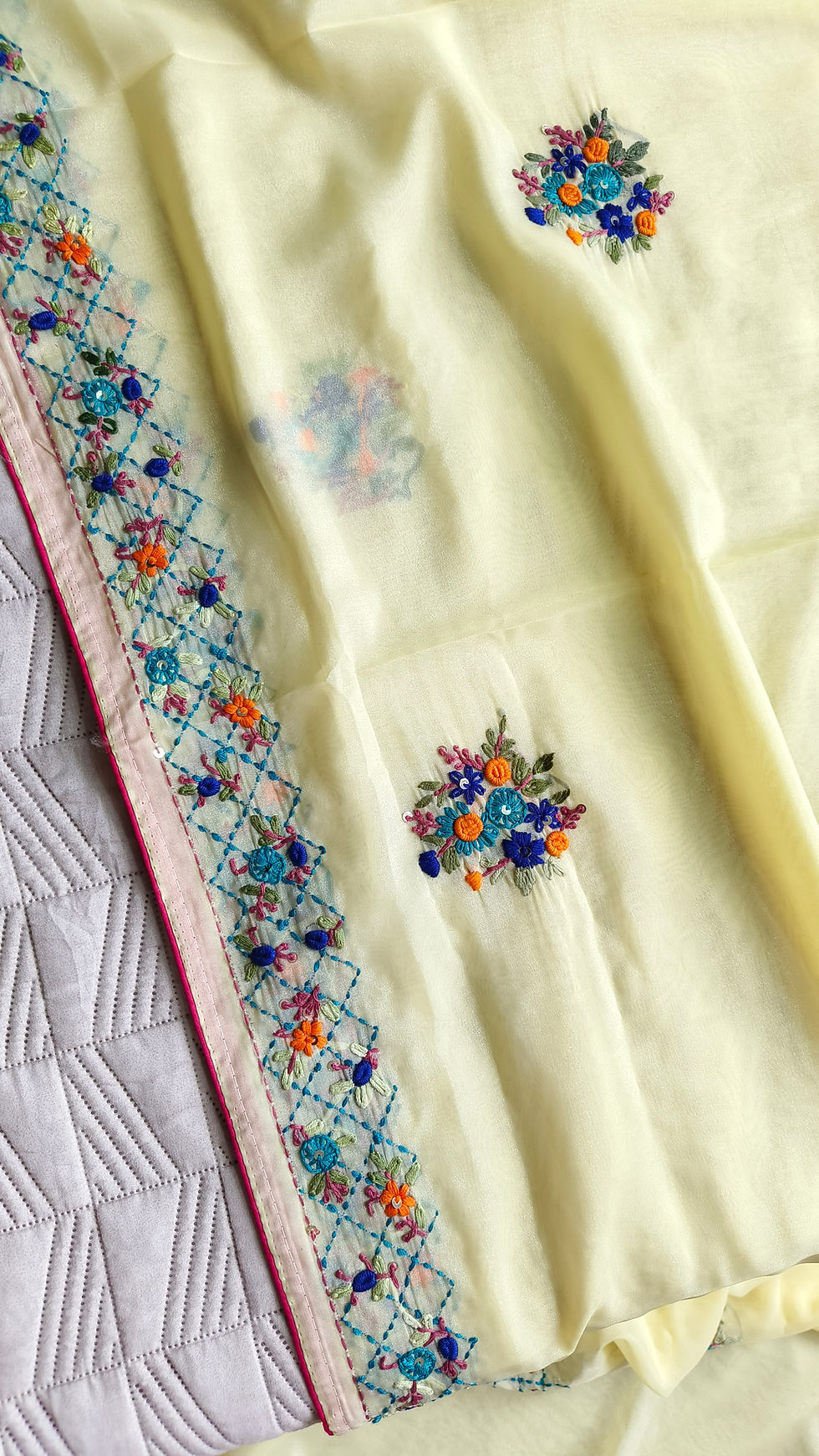 Close-up of Parsi Gara-inspired Kantha hand embroidery on Crepe Tissue