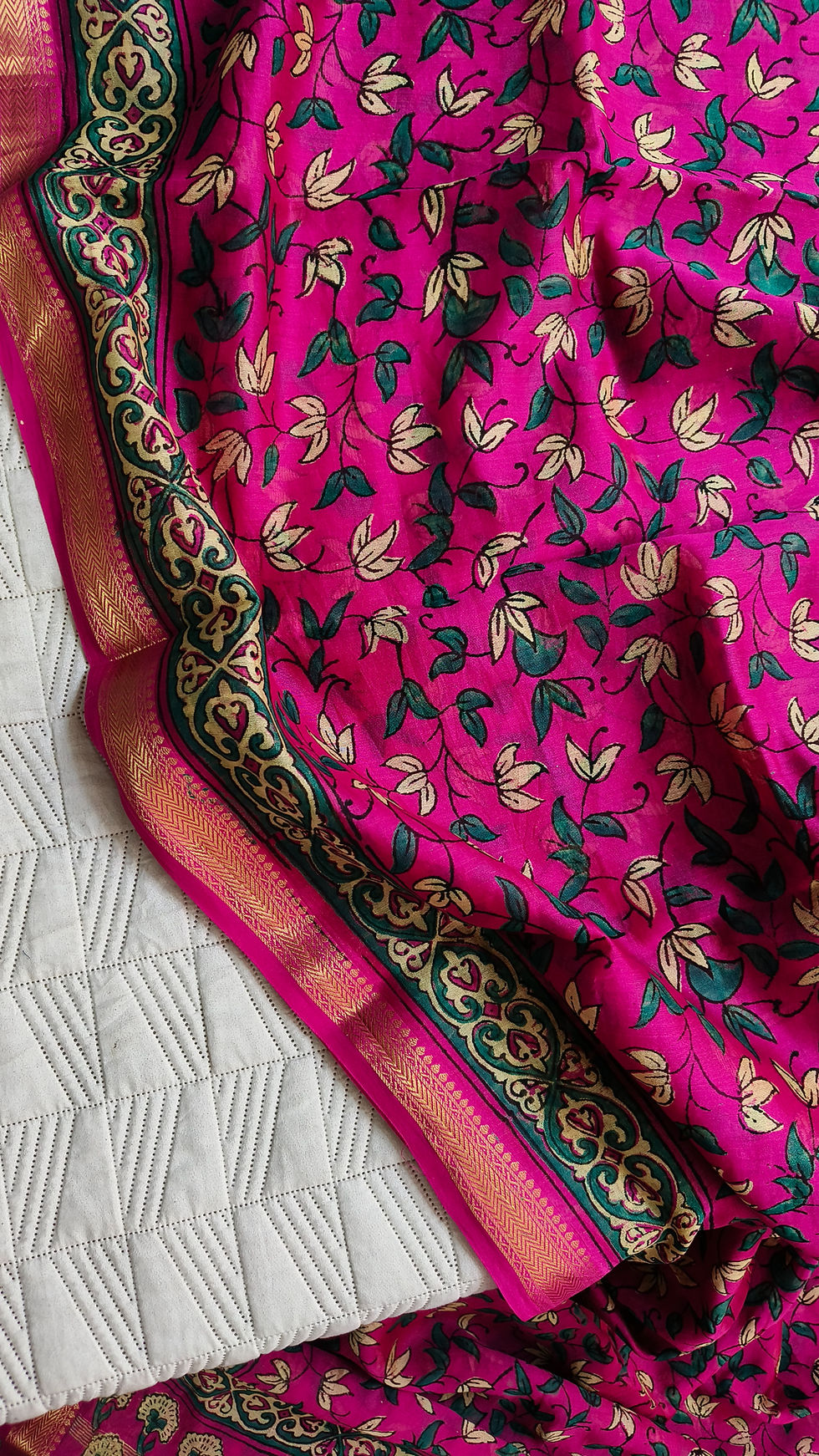 Close-up of handblock printed border on Maheshwari cotton silk saree showing traditional craftsmanship