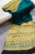 Handcrafted Ajrakh modal silk saree with half and half handblock print in muted yellow and natural dyes