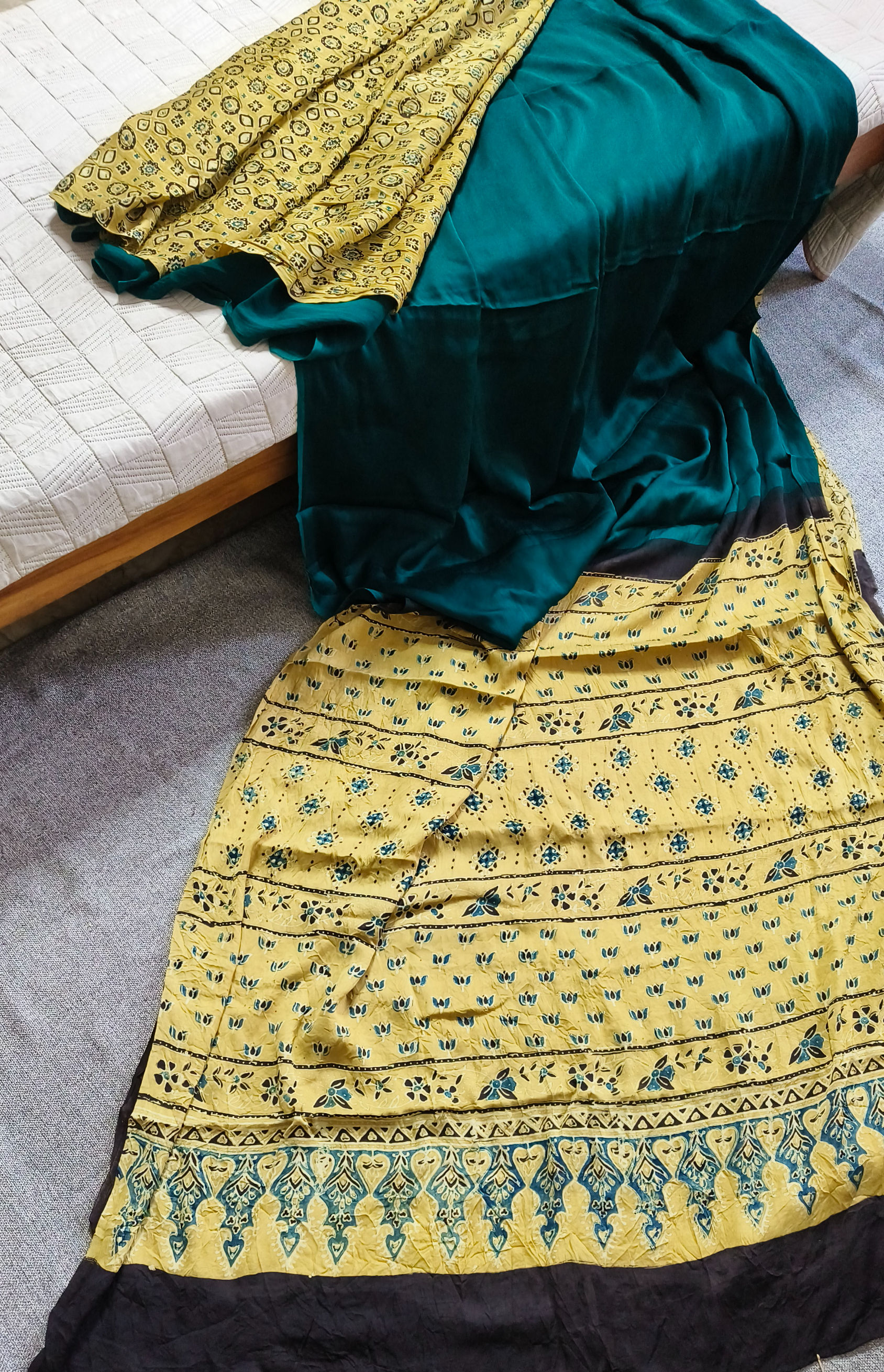Handcrafted Ajrakh modal silk saree with half and half handblock print in muted yellow and natural dyes