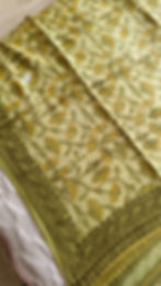 Close-up of Vanaspati handblock pista green motifs on lightweight modal silk saree