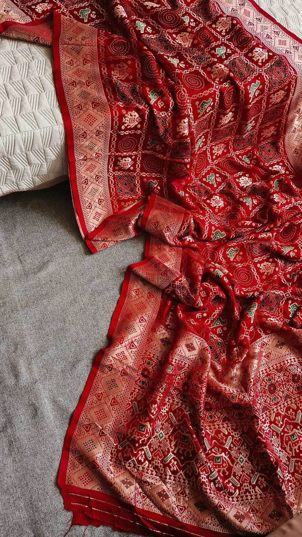 Ajrakh patola modal silk gharchola saree in red for wedding wear