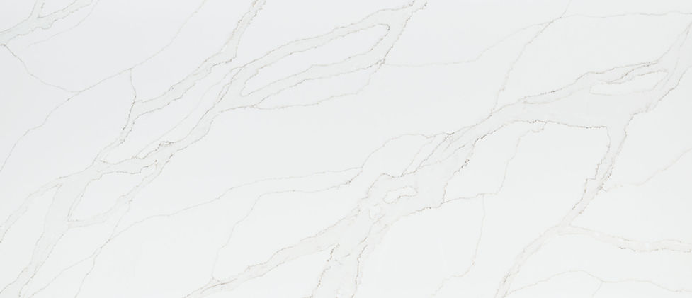 Calacatta Izaro quartz slab with delicate, drawn gray veining on warm white background