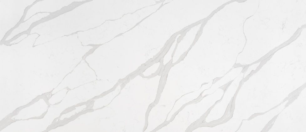 Calacatta Luccia quartz slab with layered veining in muted gray and warm tones