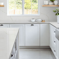 Calacatta Rusta quartz countertop in warm traditional kitchen