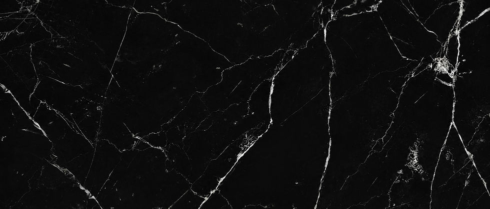 Nero Marquina porcelain slab, crisp white veining on black, Toronto
