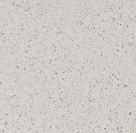 Close-up of Peppercorn White quartz showing pebbled flecks and soft surface