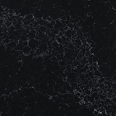 Close-up of Midnight Corvo quartz showing deep black surface texture
