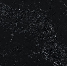 Close-up of Midnight Corvo quartz showing deep black surface texture