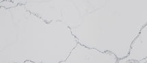 Close-up of Statuary Classique quartz showing bold Statuario-style gray veining