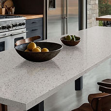 Peppercorn White quartz countertop in transitional kitchen interior