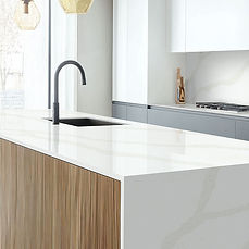 Calacatta Belaros quartz countertop in transitional kitchen interior