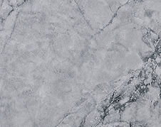 Carrara Ombra quartz countertop close-up, gentle white veining on soft grey, Toronto