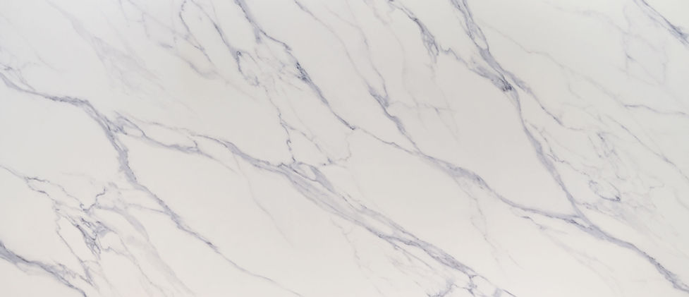 Calacatta Anava quartz slab with cool gray marble-look veining on warm white background