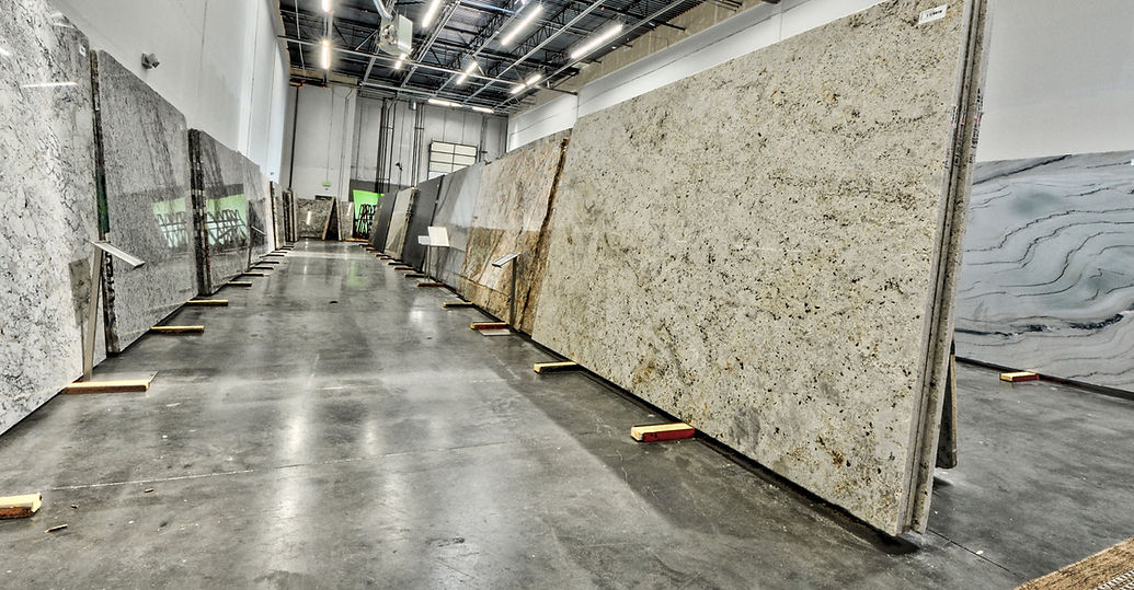 Stone Wizards warehouse with quartz and granite slabs in stock
