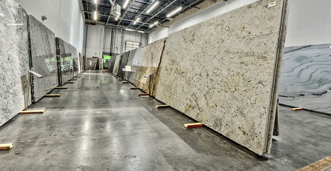 Stone Wizards warehouse with quartz and granite slabs in stock