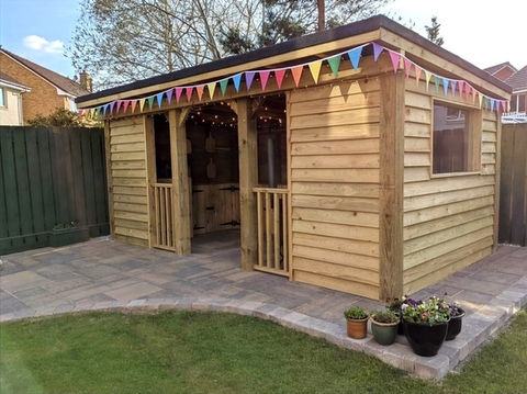 bespoke custom garden room pizza hut shelter. Wooden outdoor build.