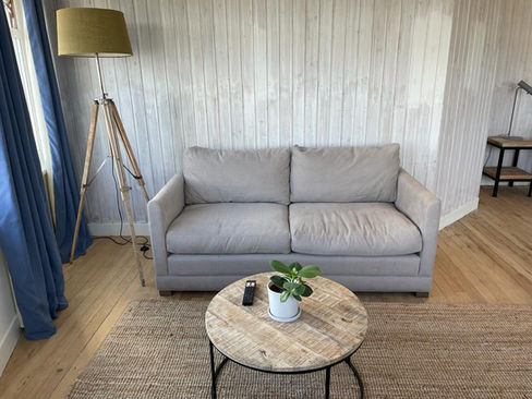 Part of our six Person Suites -  a comfy sofa / double bed.