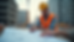 Eye-level view of a civil engineer reviewing construction plans at a site
